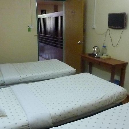 7 Hung Hung Inn 亞庇 外观 照片